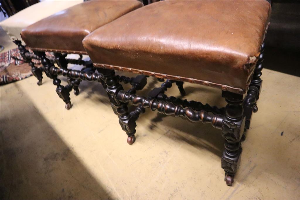 A set of nine Victorian Flemish style carved oak dining chairs